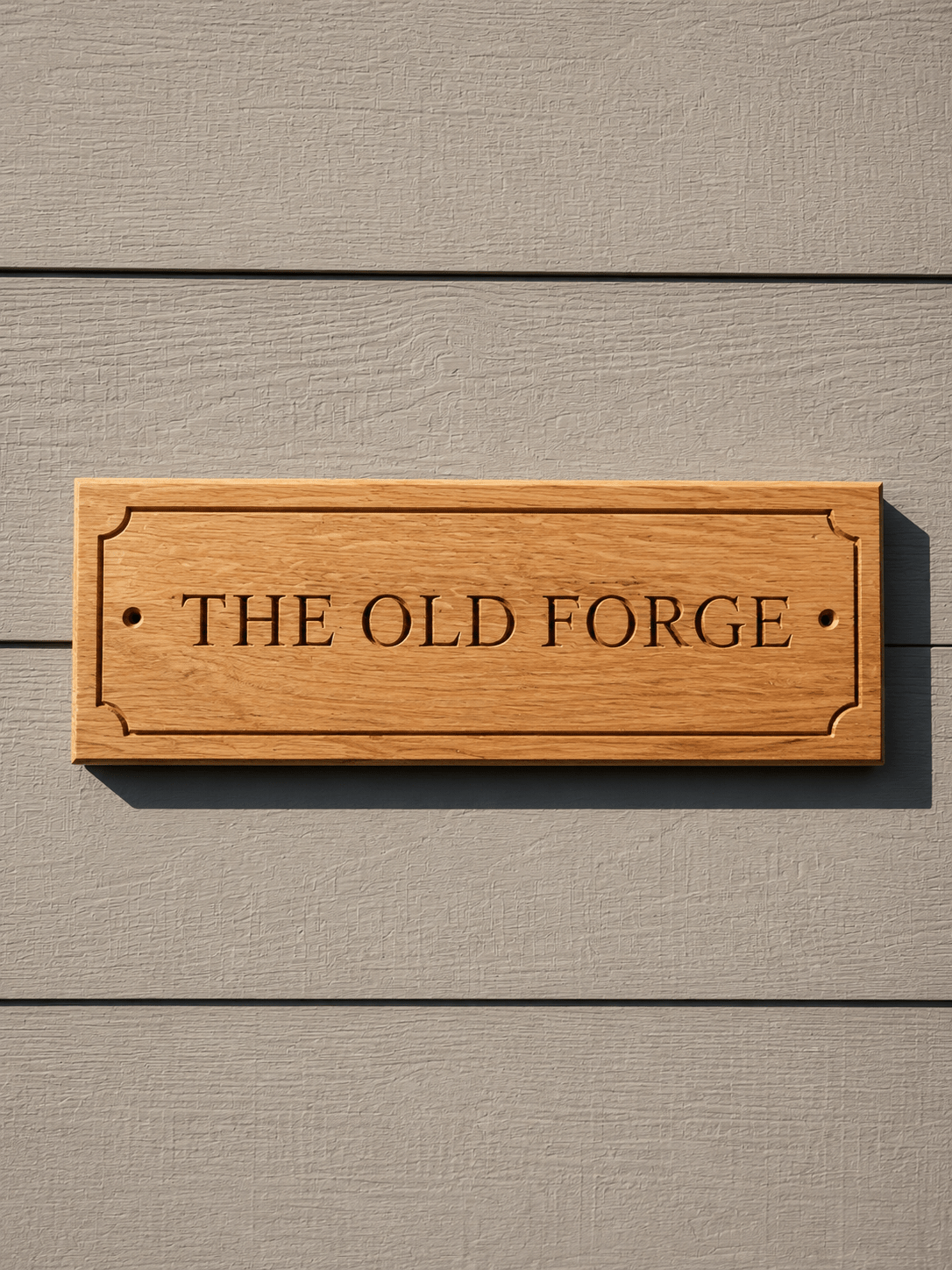 Personalised solid oak house name sign with decorative corner detailing
