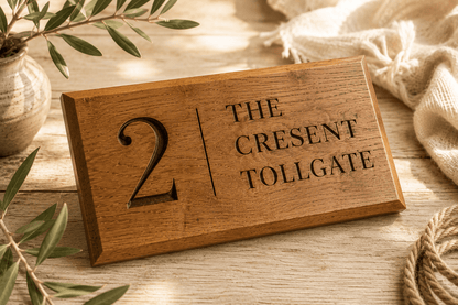 25mm thick solid oak house sign showing engraved face and timber depth