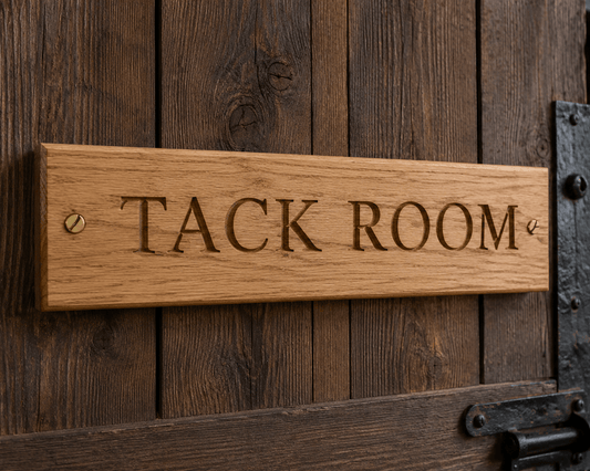Solid oak tack room sign fitted to a traditional stable door